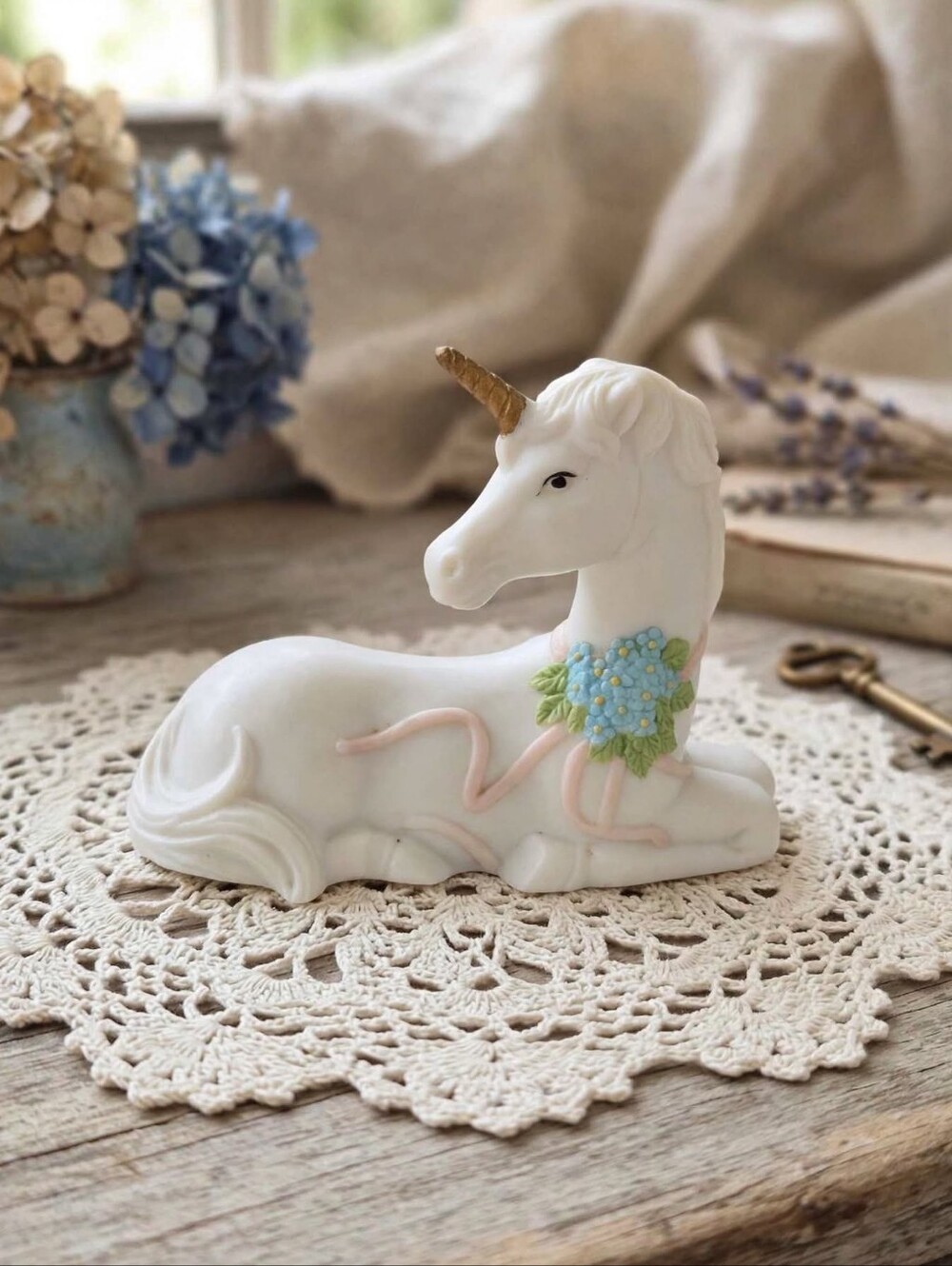 Vintage Giftcraft Matte White Unicorn Figurine with Blue Floral Garland